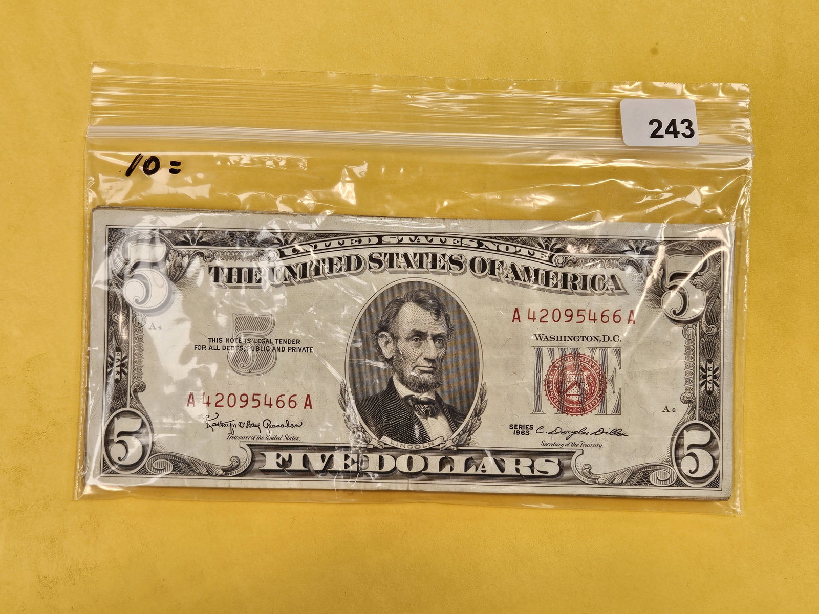 Ten $5 US Note Red Seals: From dealer. Unchecked by us