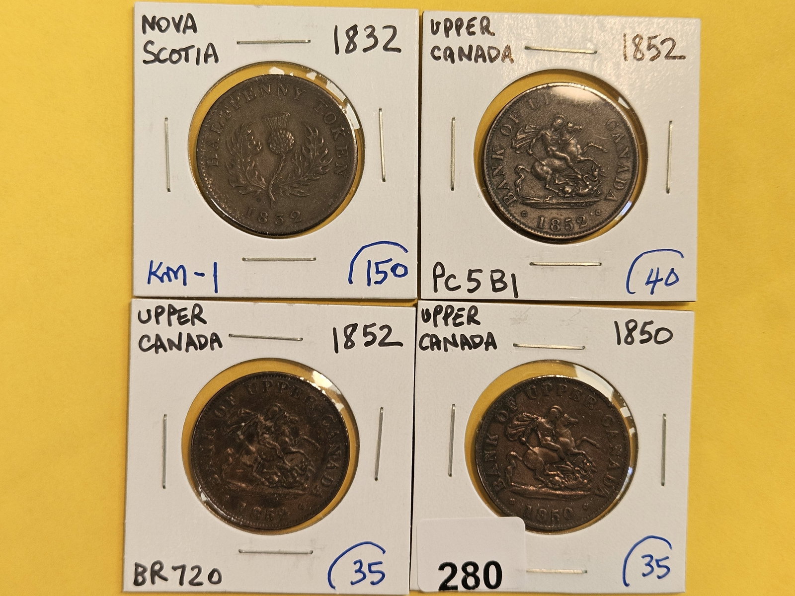 Four nicer Upper Canada and Nova Scotia Copper half-penny tokens (1 of 6)