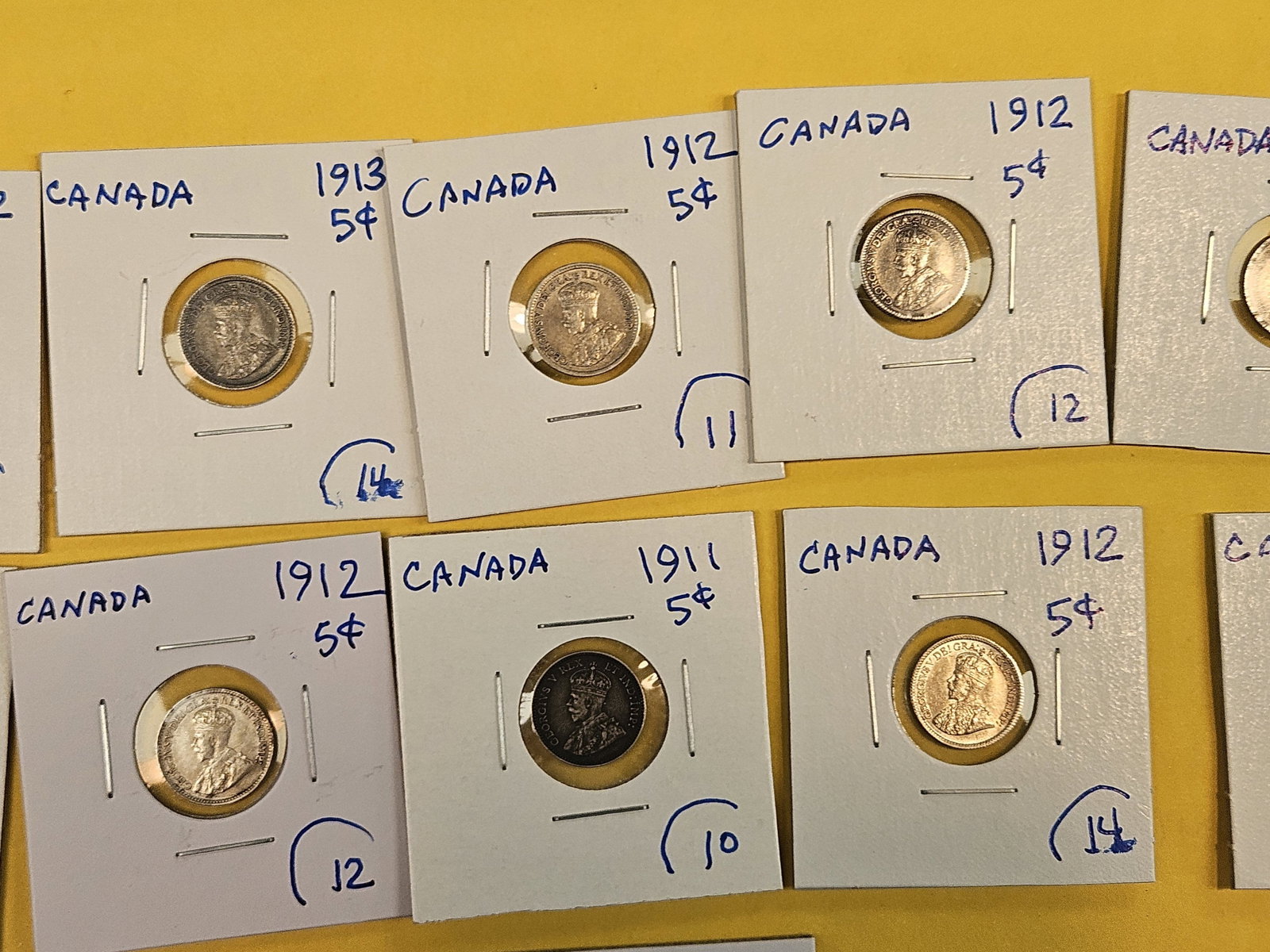 Eighteen, silver, Canadian 5 cent coins - 3