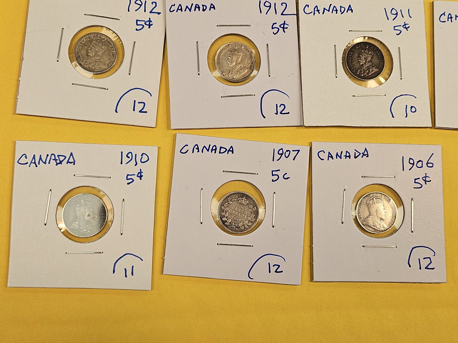 Eighteen, silver, Canadian 5 cent coins - 5