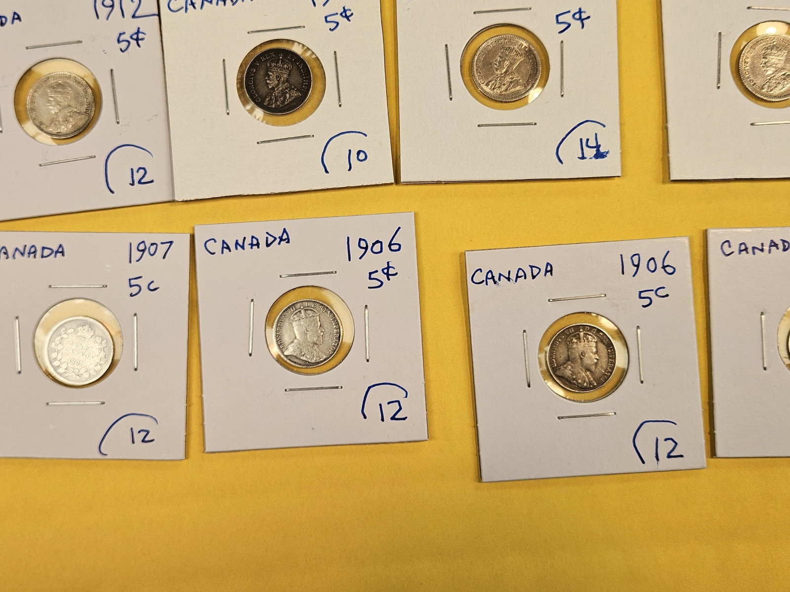 Eighteen, silver, Canadian 5 cent coins - 6