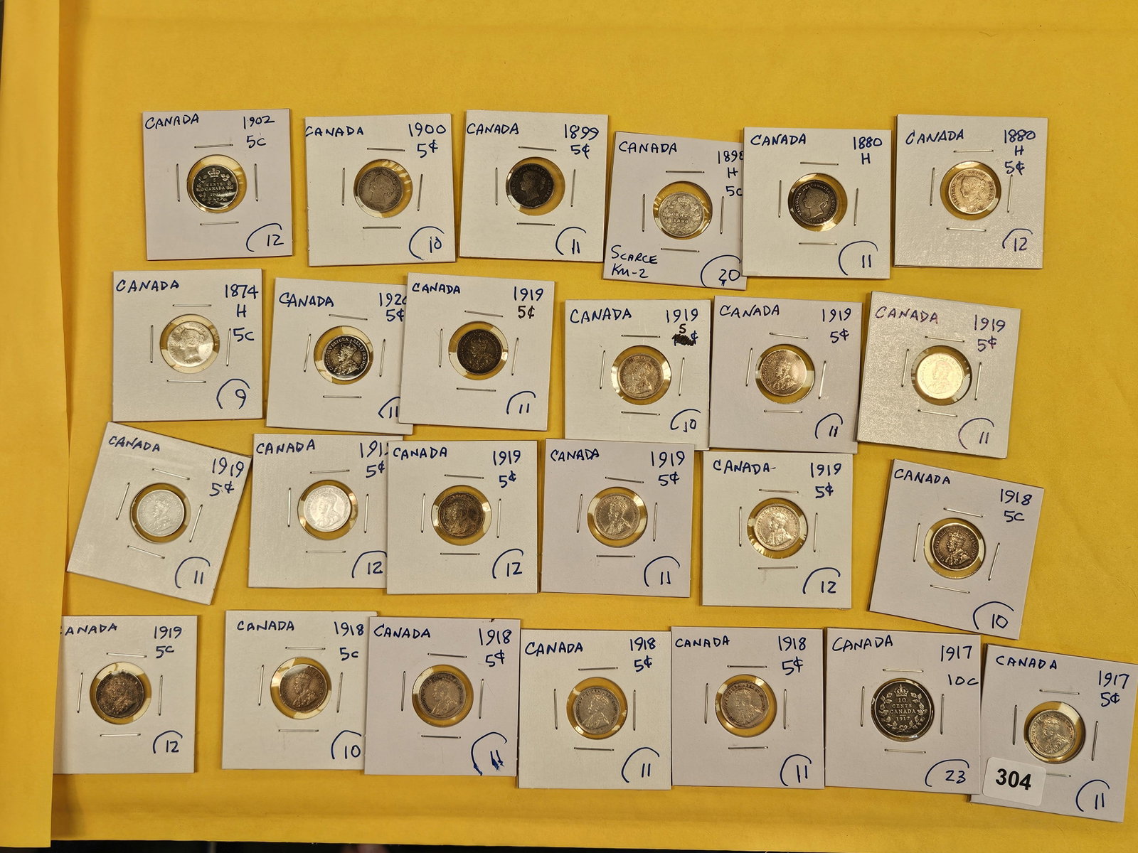 Twenty-five, silver, Canadian coins: All but 1 are 5 cent coins