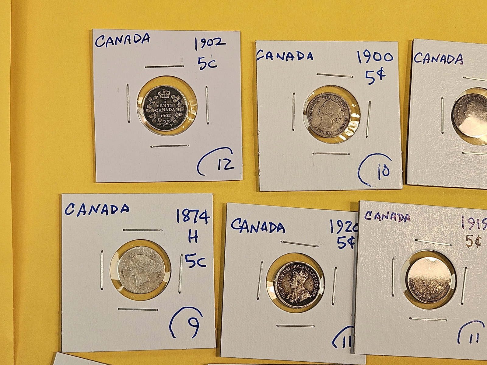 Twenty-five, silver, Canadian coins - 2