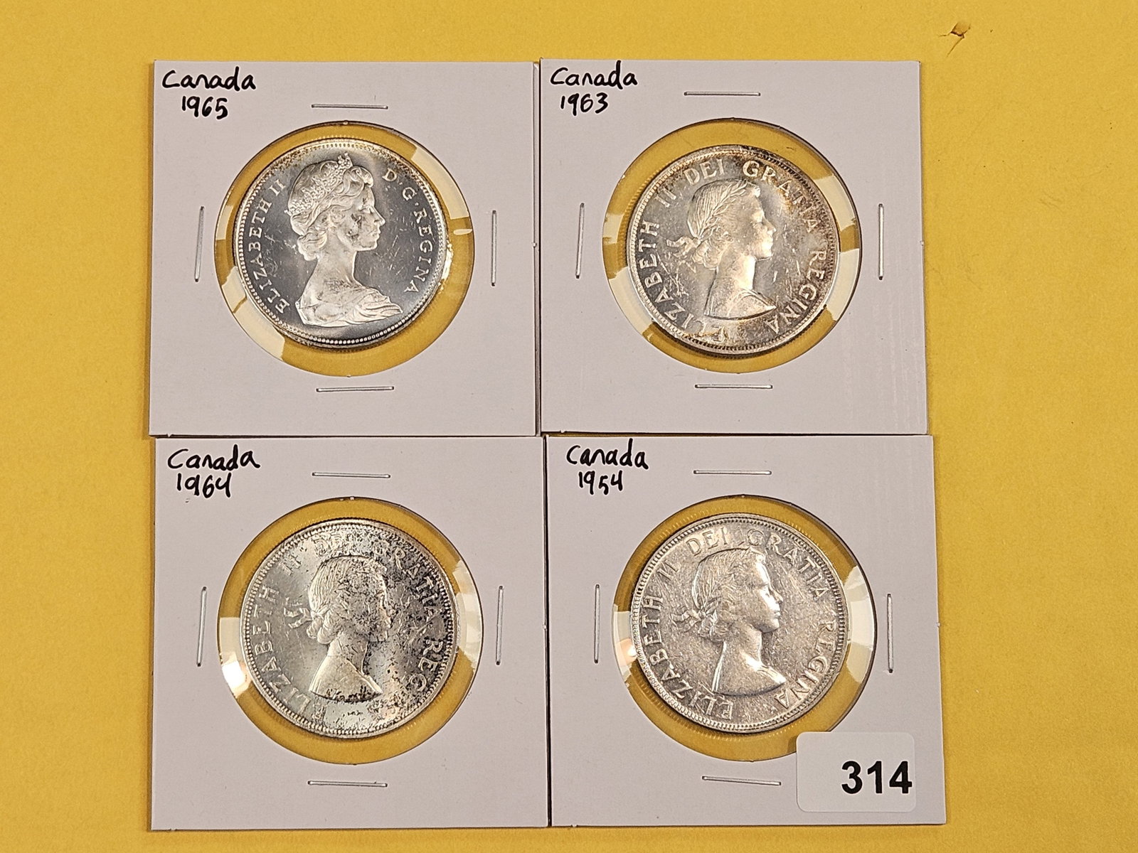 Four Mixed Canadian Silver Dollars - 2