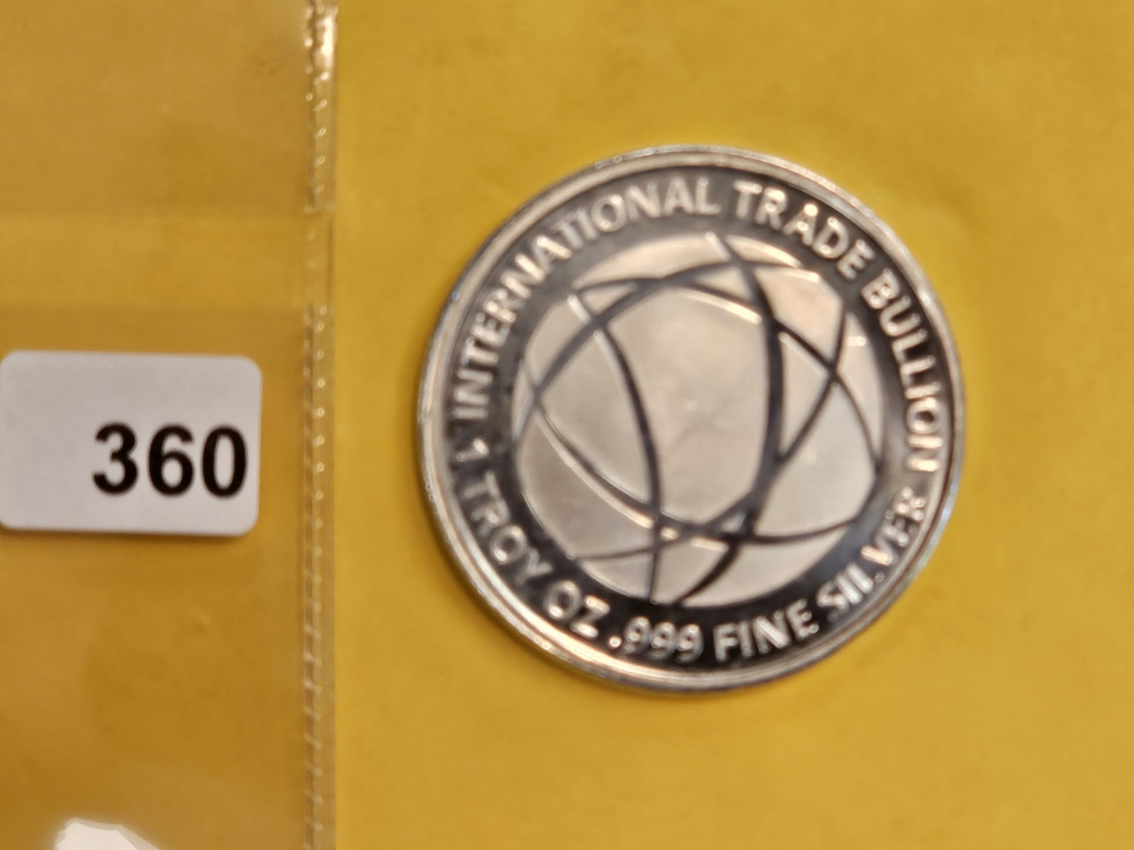 One Troy ounce .999 fine silver art round: International Trade Bullion