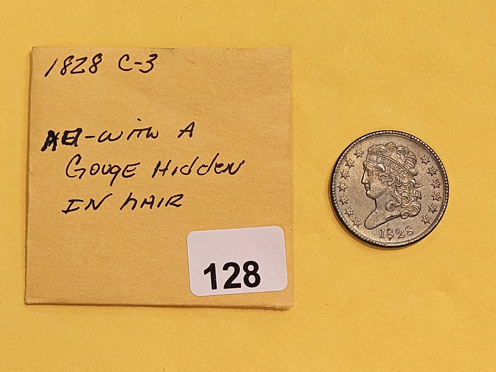 1828 Classic Head Half Cent in About Uncirculated - 2