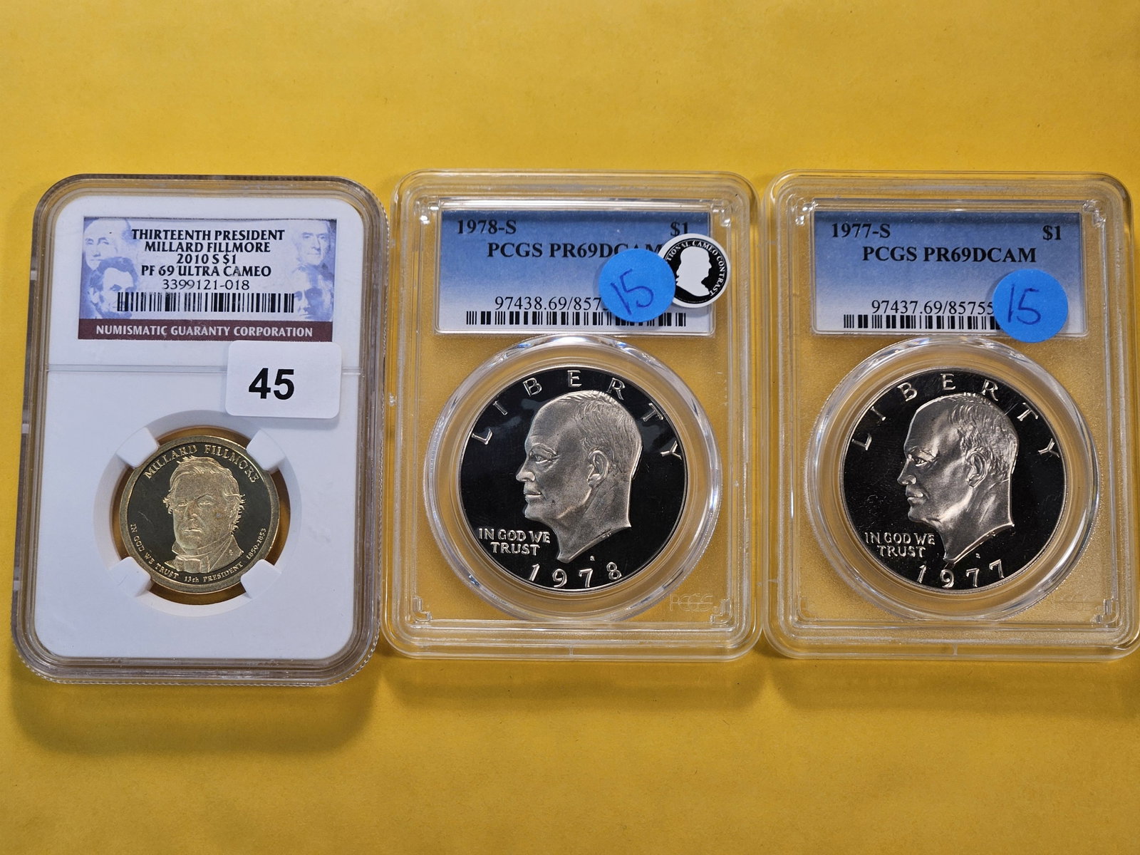 Three Graded US Dollars in Proof 69 Deep and Ultra Cameo