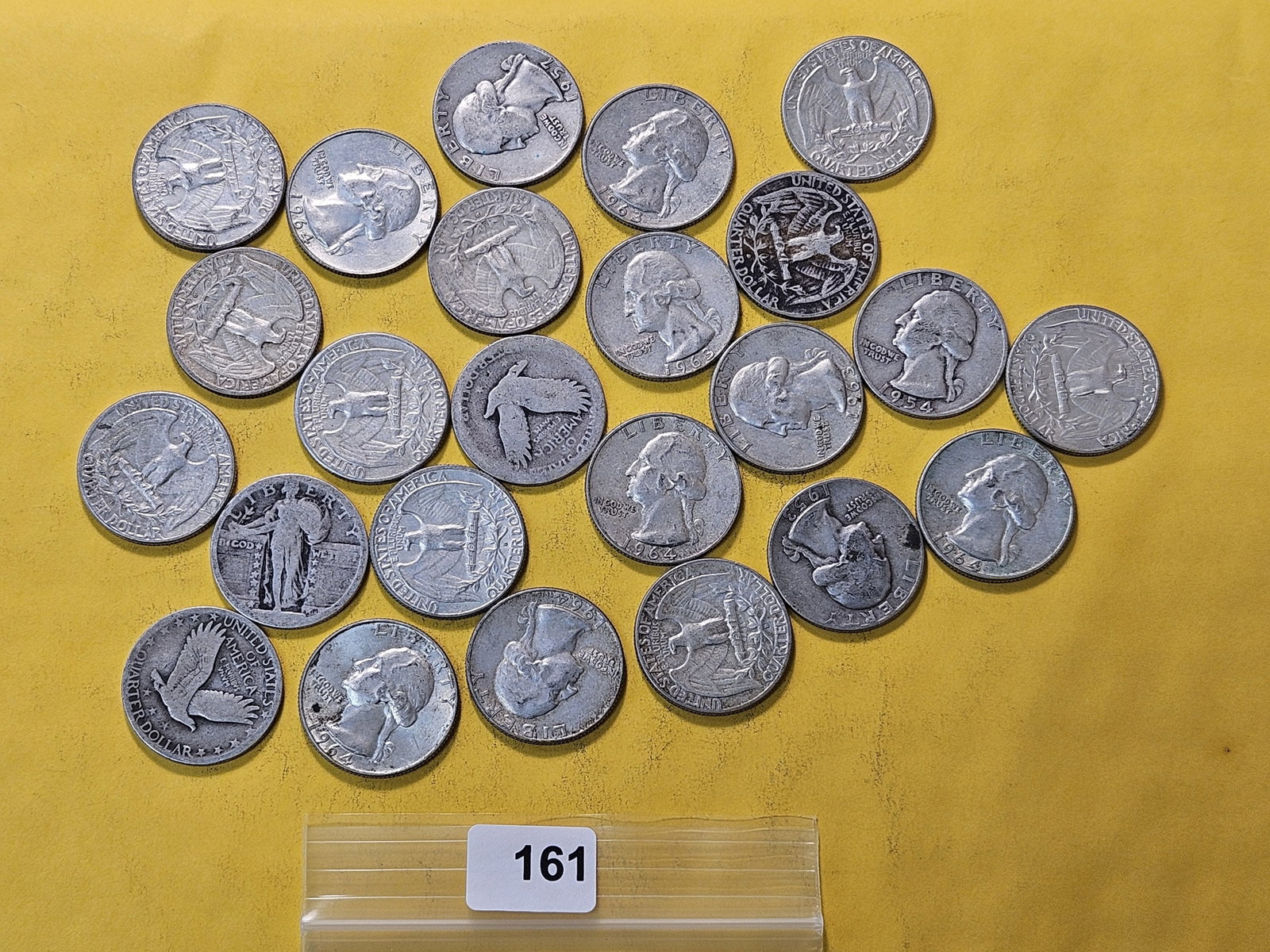 Twenty-four Mixed US Silver Quarters: Mostly Washingtons, with a few Standing Liberty Silver Quarters