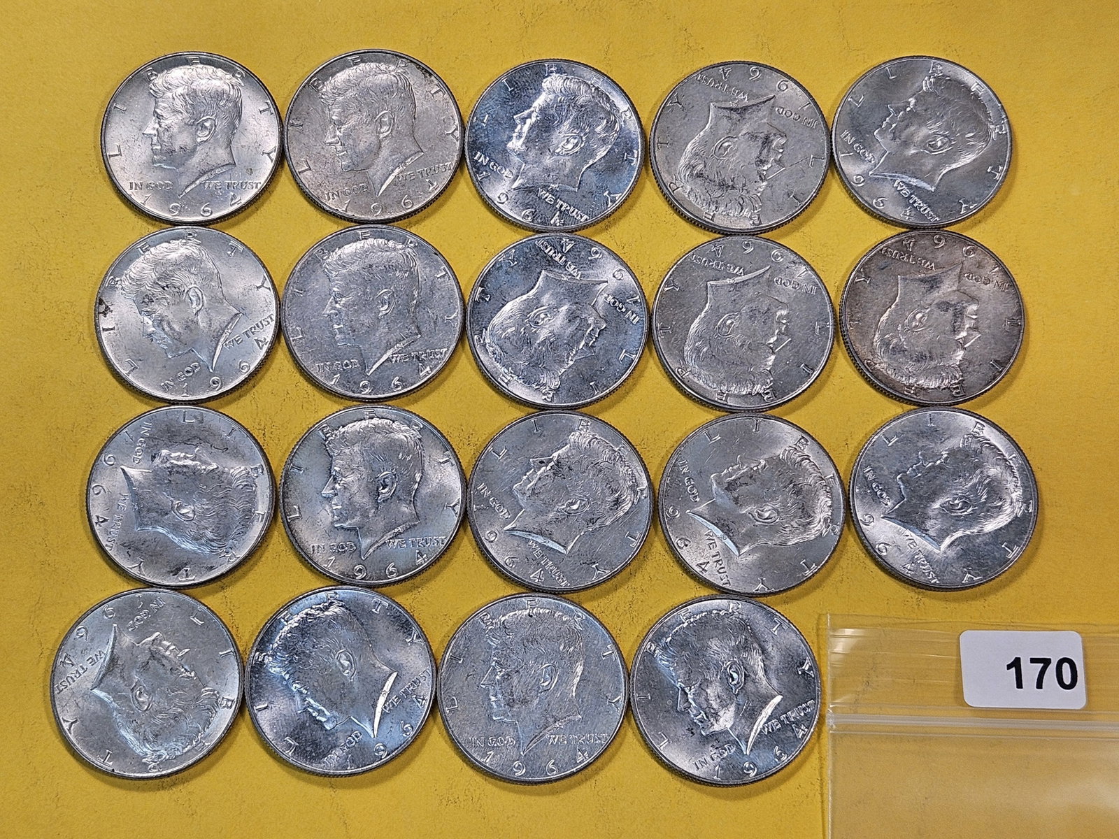 Nineteen 1964 Kennedy Silver Half Dollars: About Uncirculated and Brilliant Uncirculated