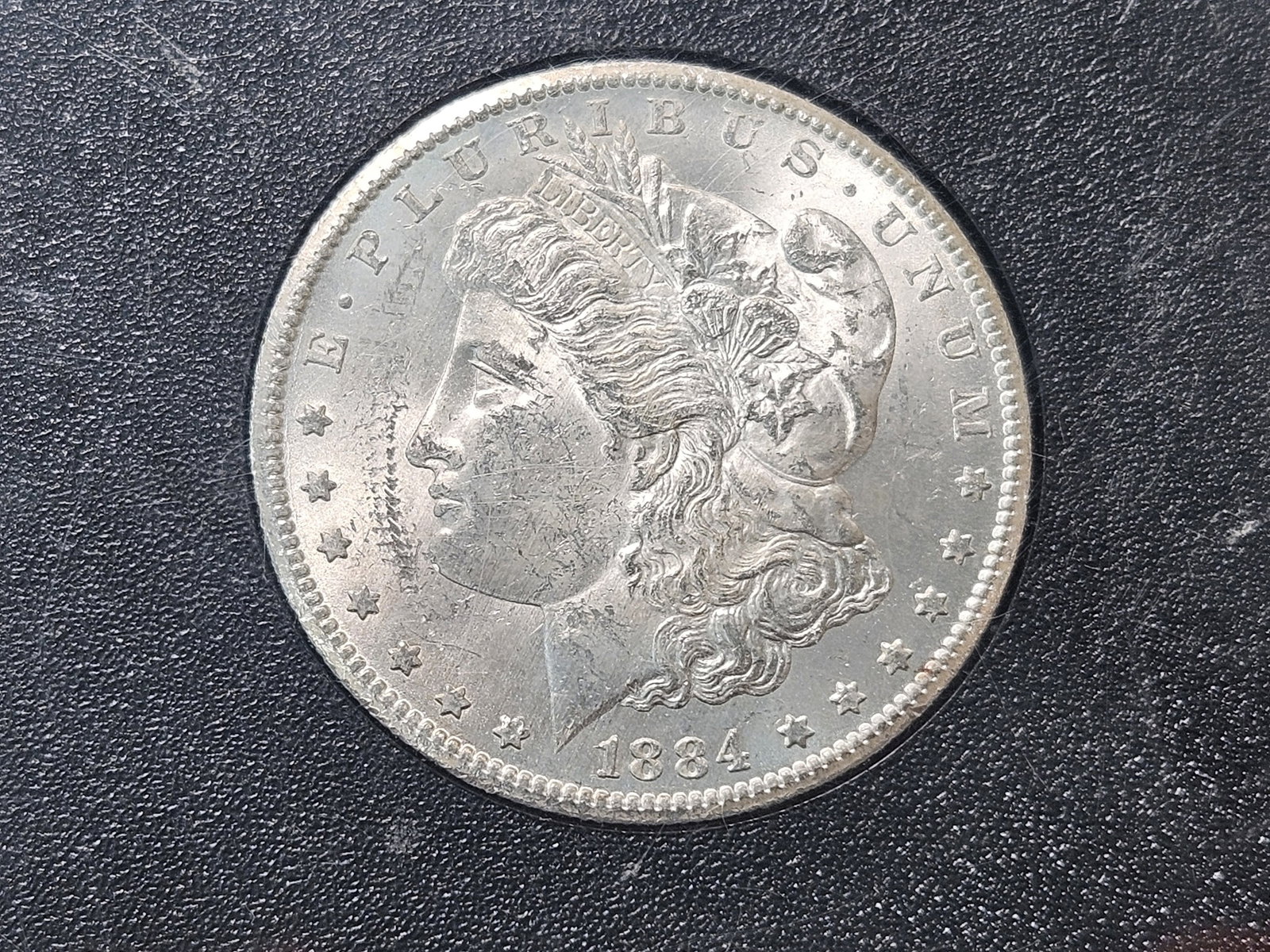 KEY DATE! GSA Brilliant Uncirculated 1884-CC Morgan Silver Dollar