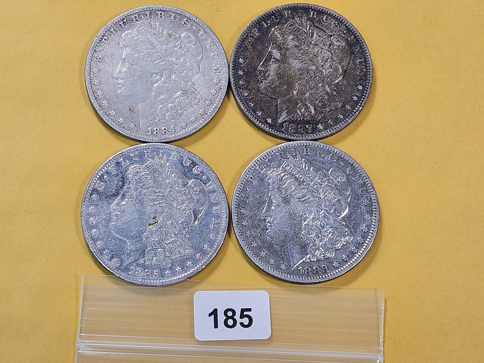 Four Circulated Morgan Silver Dollars