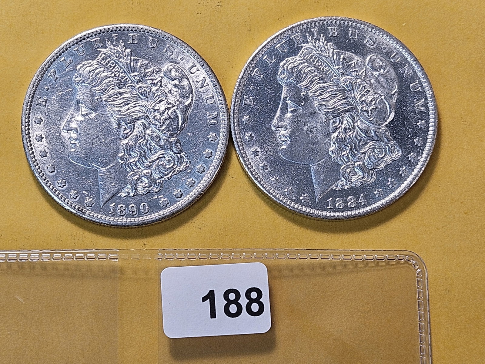 Two About Uncirculated Morgan Silver Dollars (1 of 4)