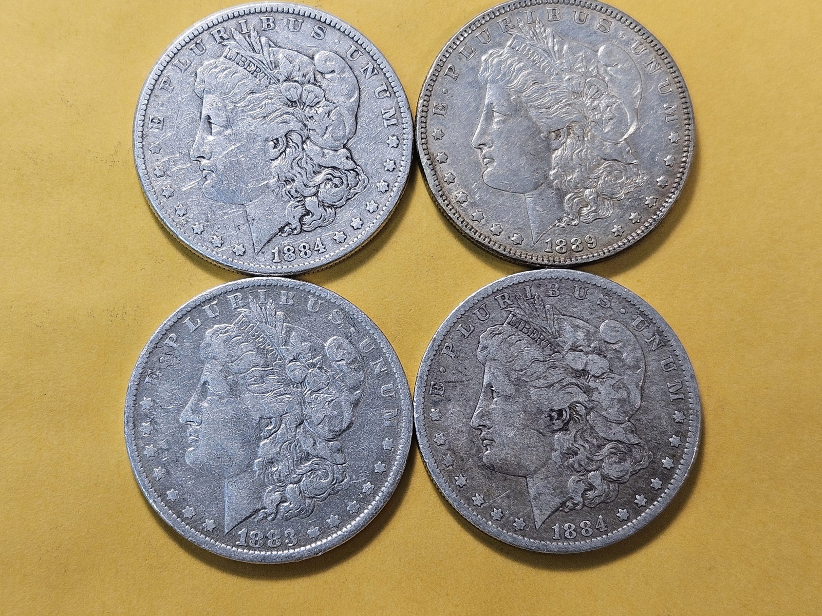 Four Circulated Morgan Silver Dollars - 2