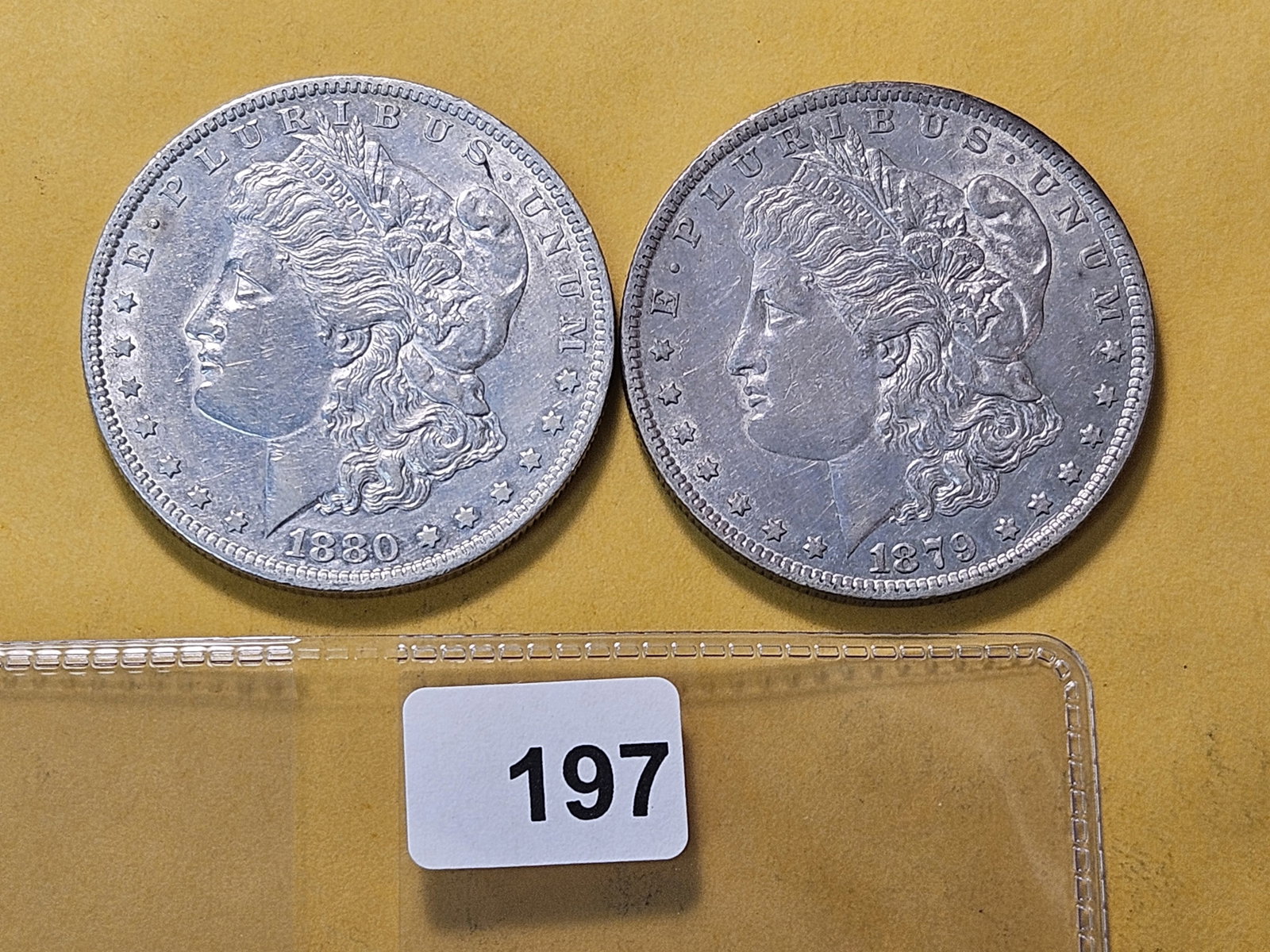 Two About Uncirculated Morgan Silver Dollars (1 of 4)