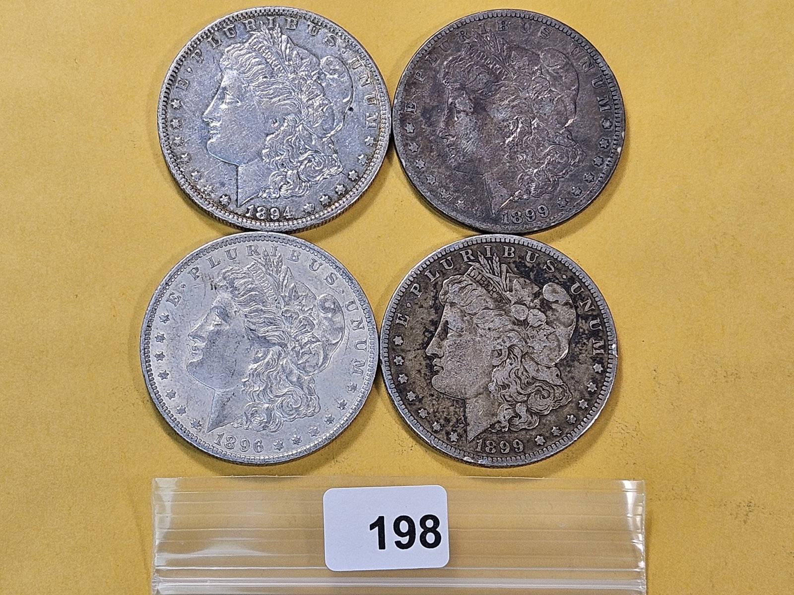 Four Circulated Morgan Silver Dollars (1 of 4)