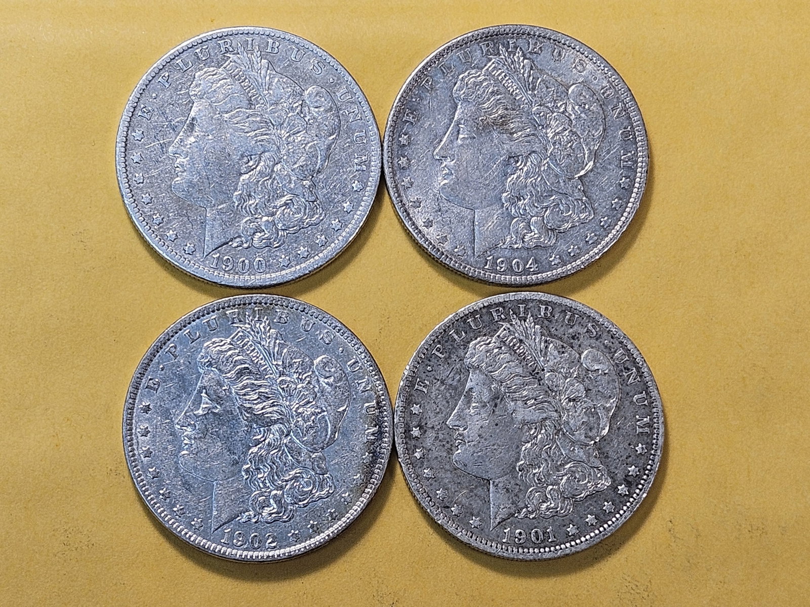 Four Circulated Morgan Silver Dollars - 2
