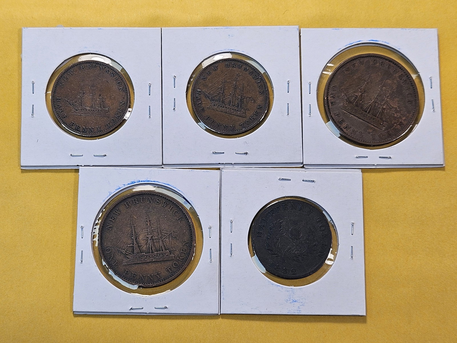 Five Copper Bank Tokens from New Brunswick and Nove Scotia - 5