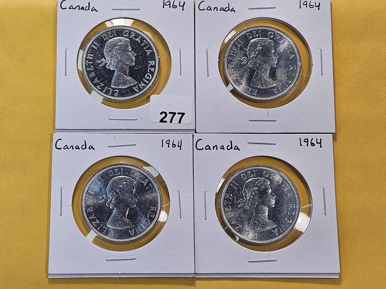 Four Brilliant Uncirculated 1964 Canadian Silver Dollars