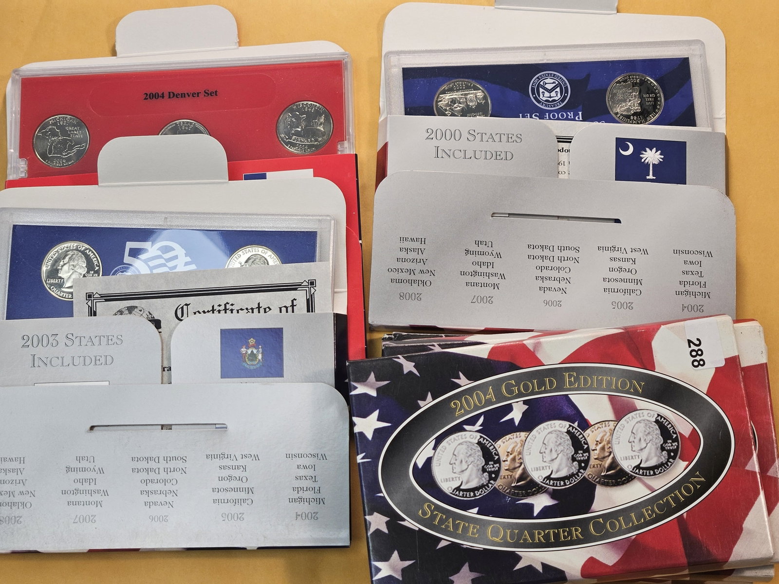 Seven US Mint Proof and Uncirculated Quarter Sets - 2