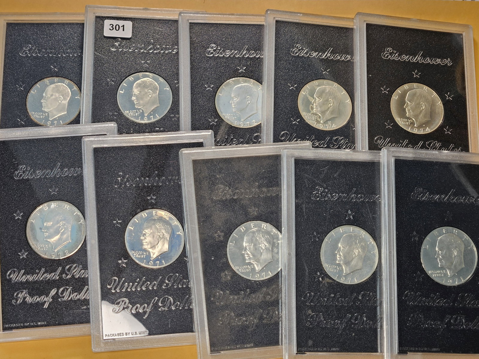 Ten US Mint Eisenhower Silver Dollars: In GSA Hardcases. Without outer box or COA
