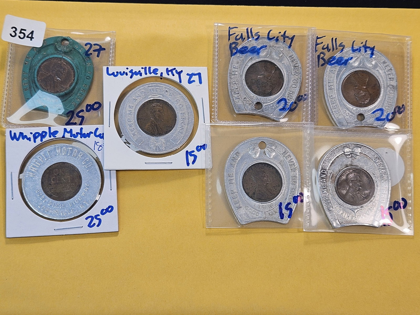 Seven Encased Wheat Cent Tokens: Mixed Dates encased Penny Tokens
