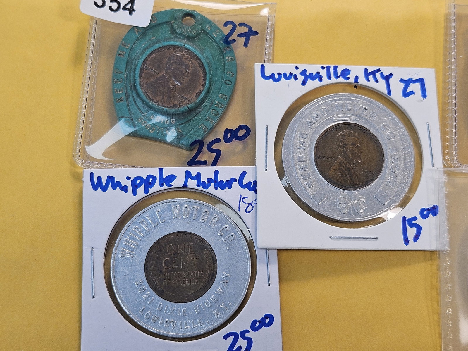 Seven Encased Wheat Cent Tokens - 2