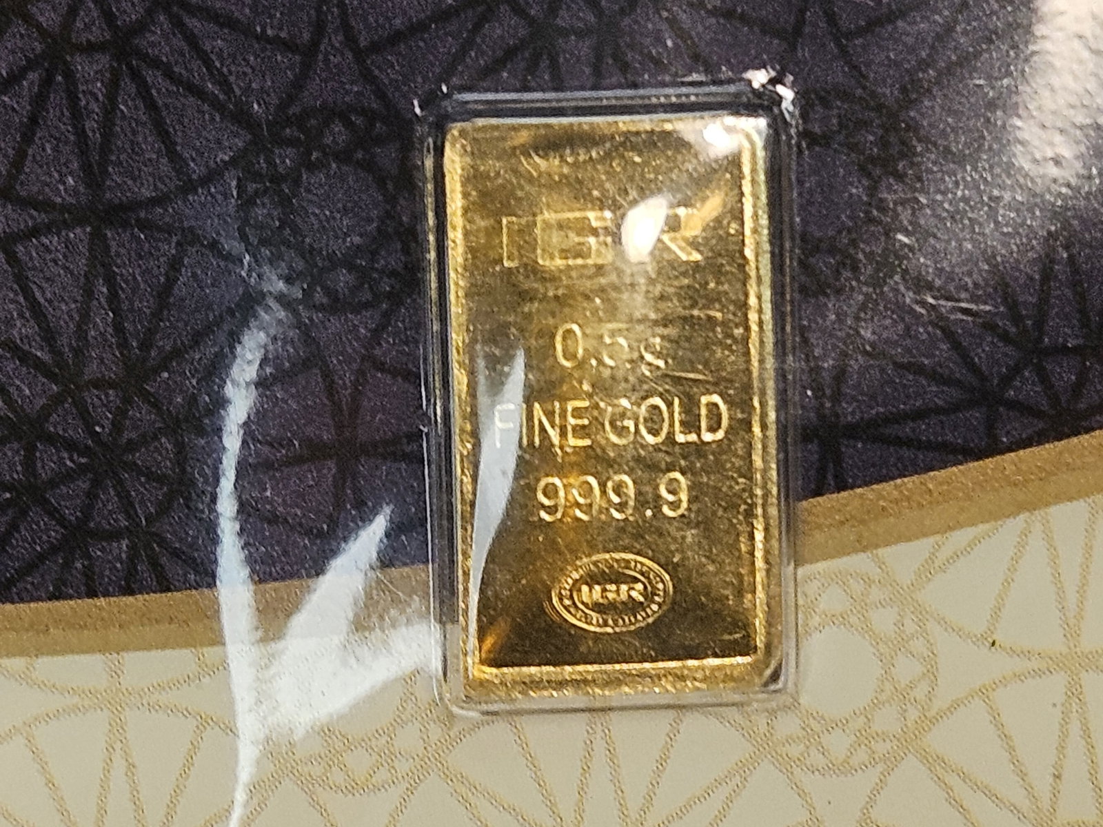 GOLD! IGR One-Half Gram .9999 fine gold bar: In assay holder