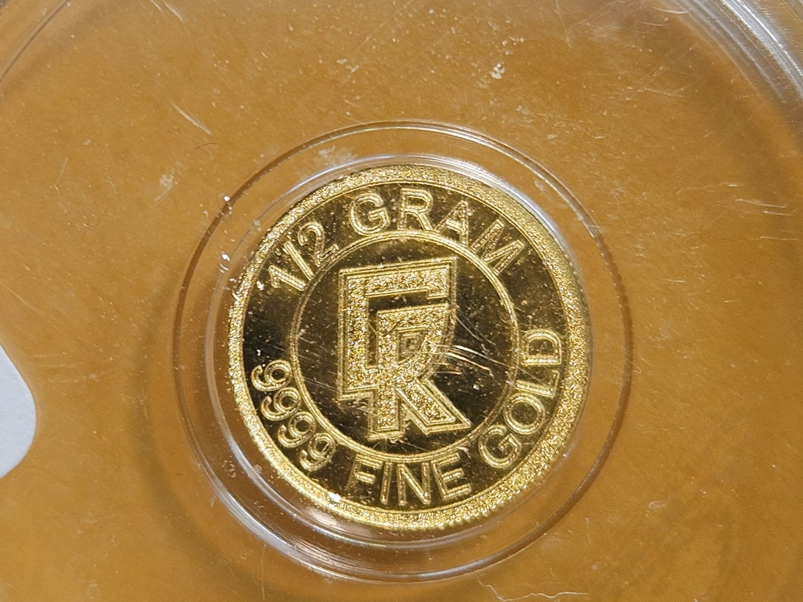 GOLD! PERFECT! ICG No Date One-Half Gram .9999 fine gold round in Mint State 70 Prooflike: Perfect Grade