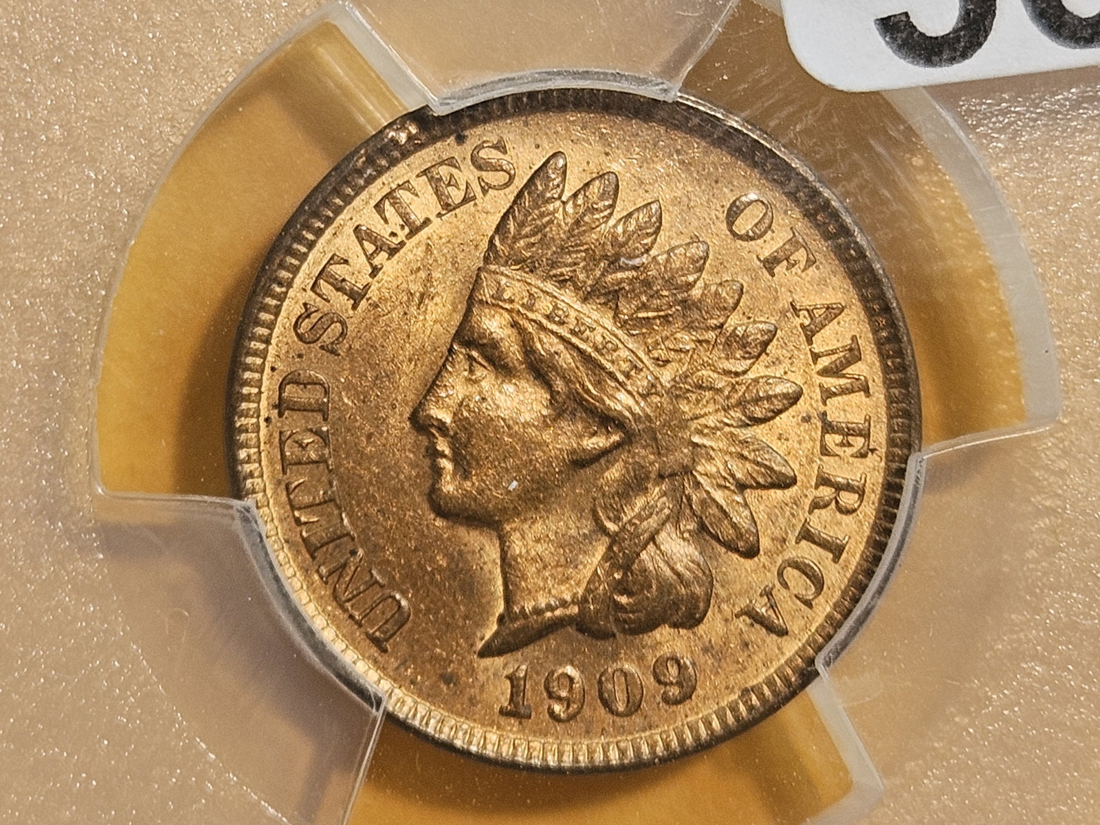 PCGS 1909 Indian Cent in Mint State 62 Red-Brown: Holdered in a PCGS 40th Anniversary slab reminiscent of an Old Green Holder