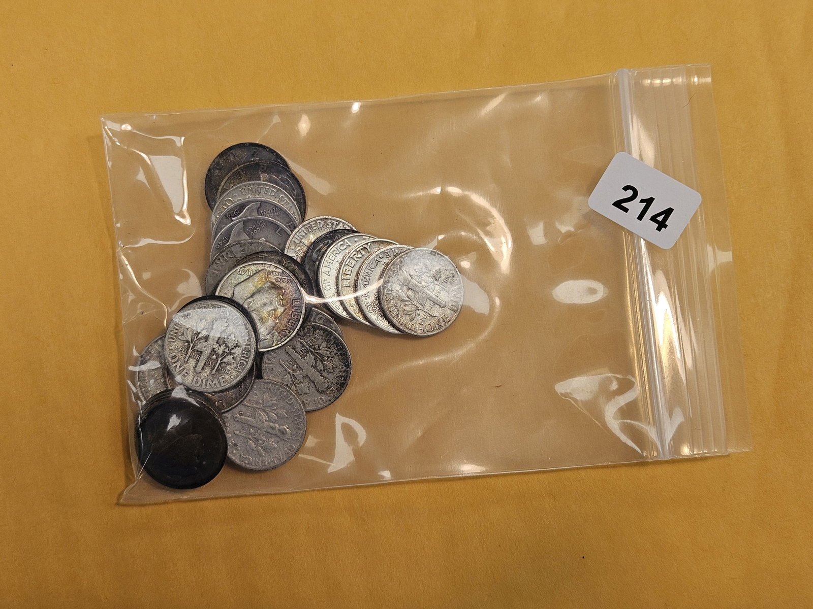 Twenty-five mixed Silver Dimes: All circulated