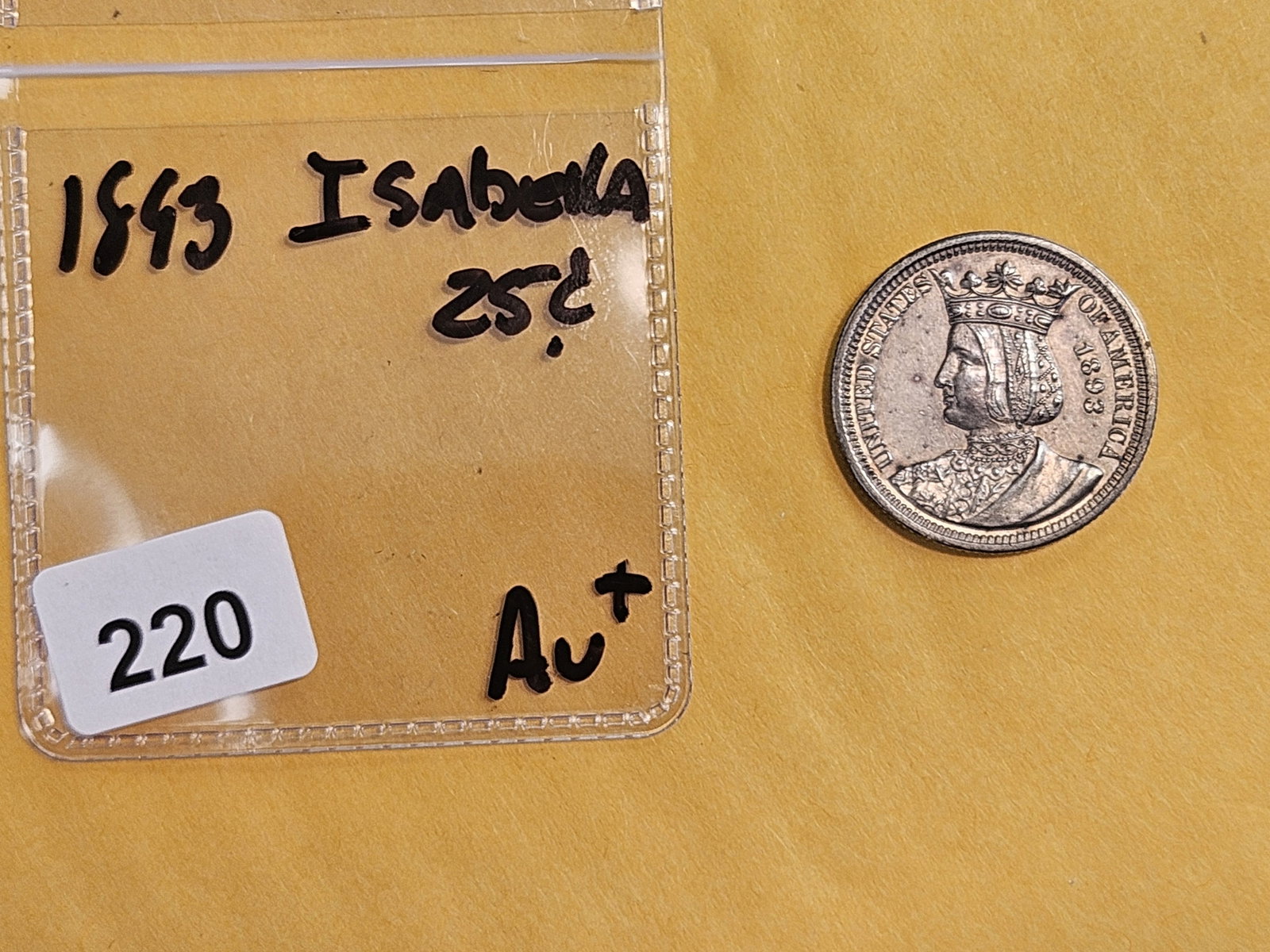 ** KEY COMMEM ** 1893 Isabella Quarter in About Uncirculated plus - 2