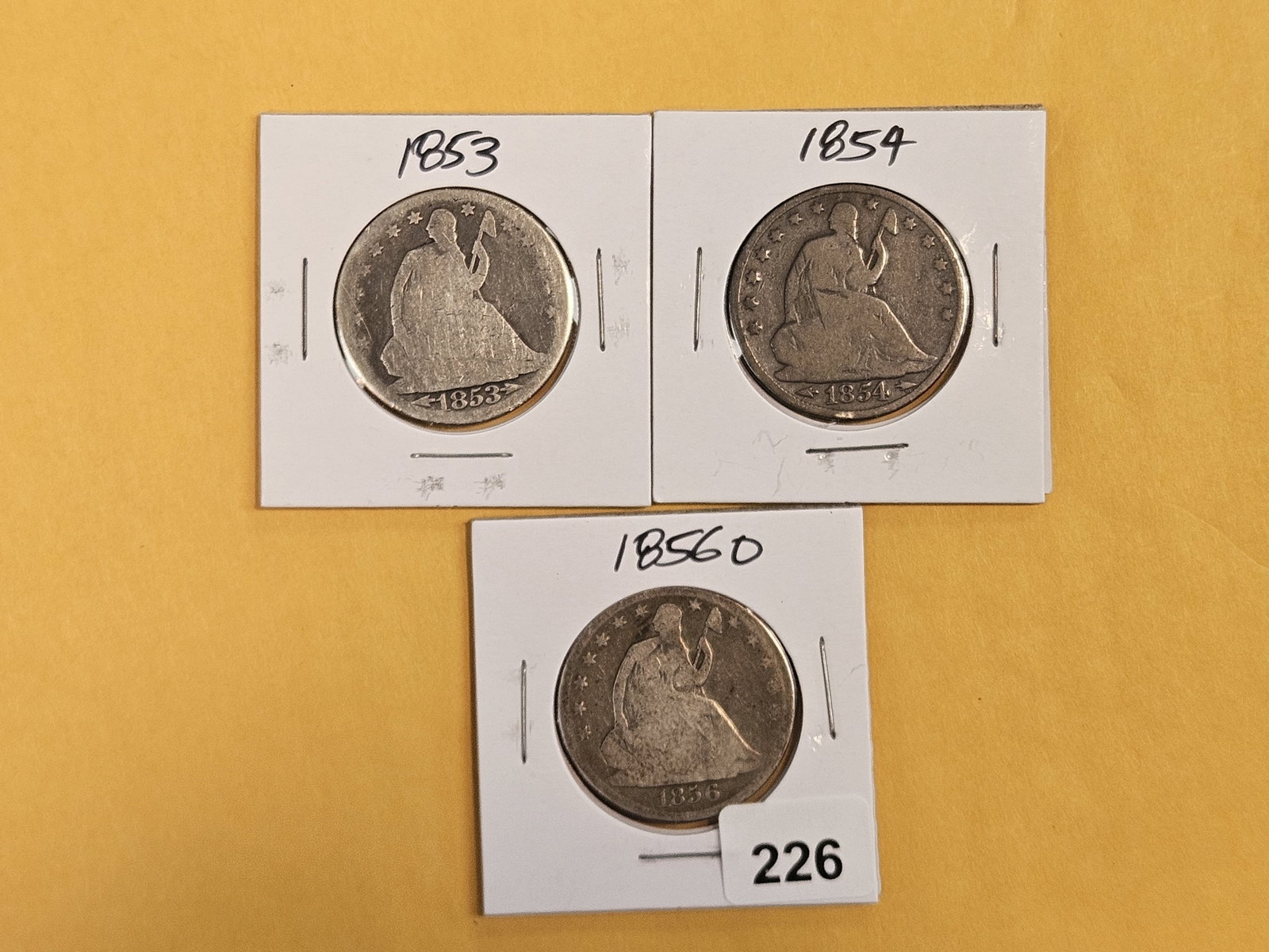 Three mixed Seated Liberty silver Half Dollars: Circulated