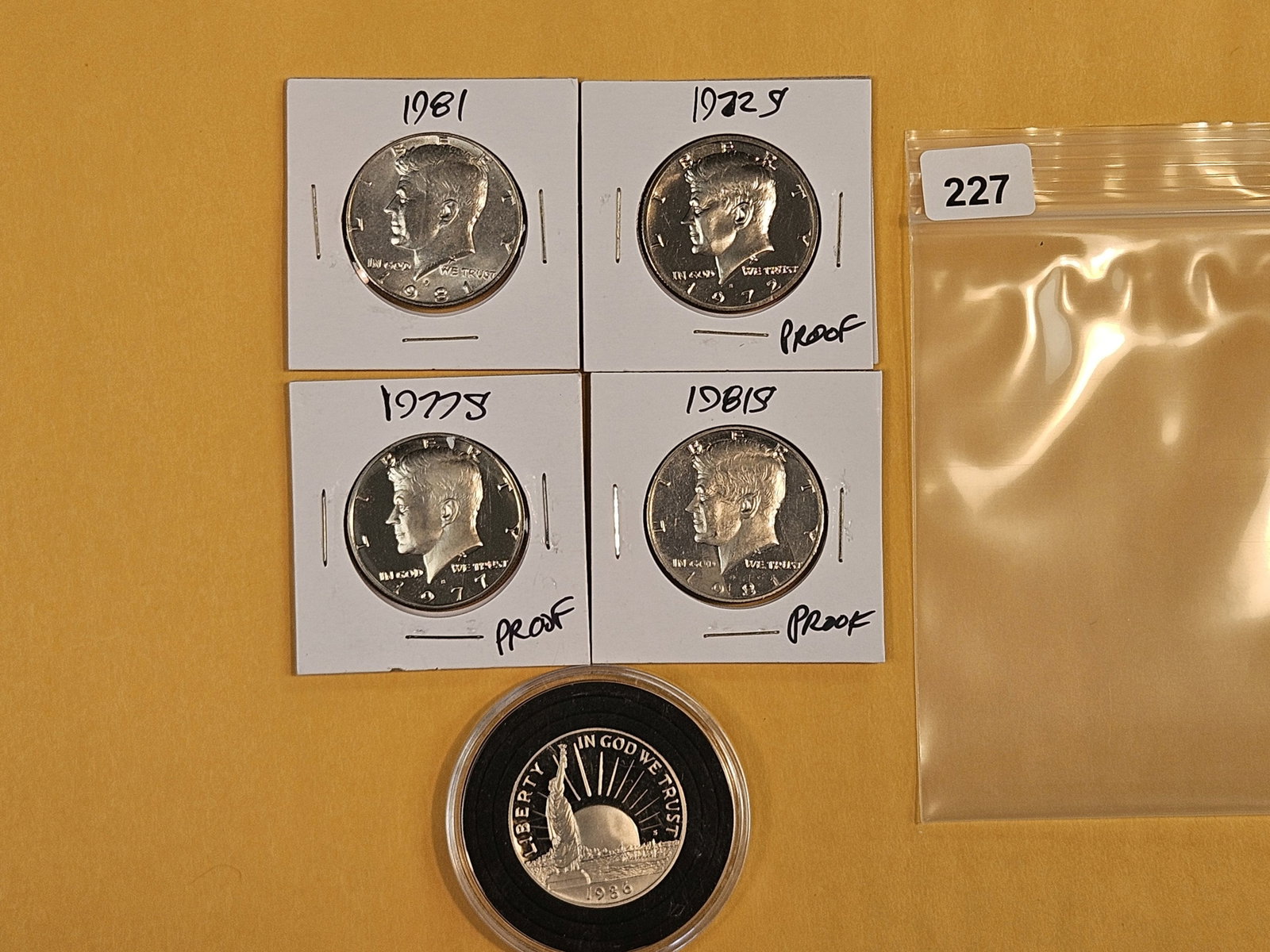 Five mixed modern half dollars: All clad