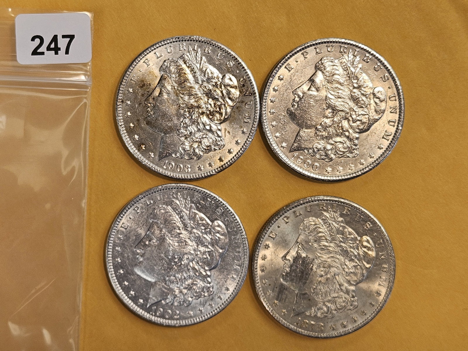 Four Bright About Uncirculated Morgan Dollars: Mixed