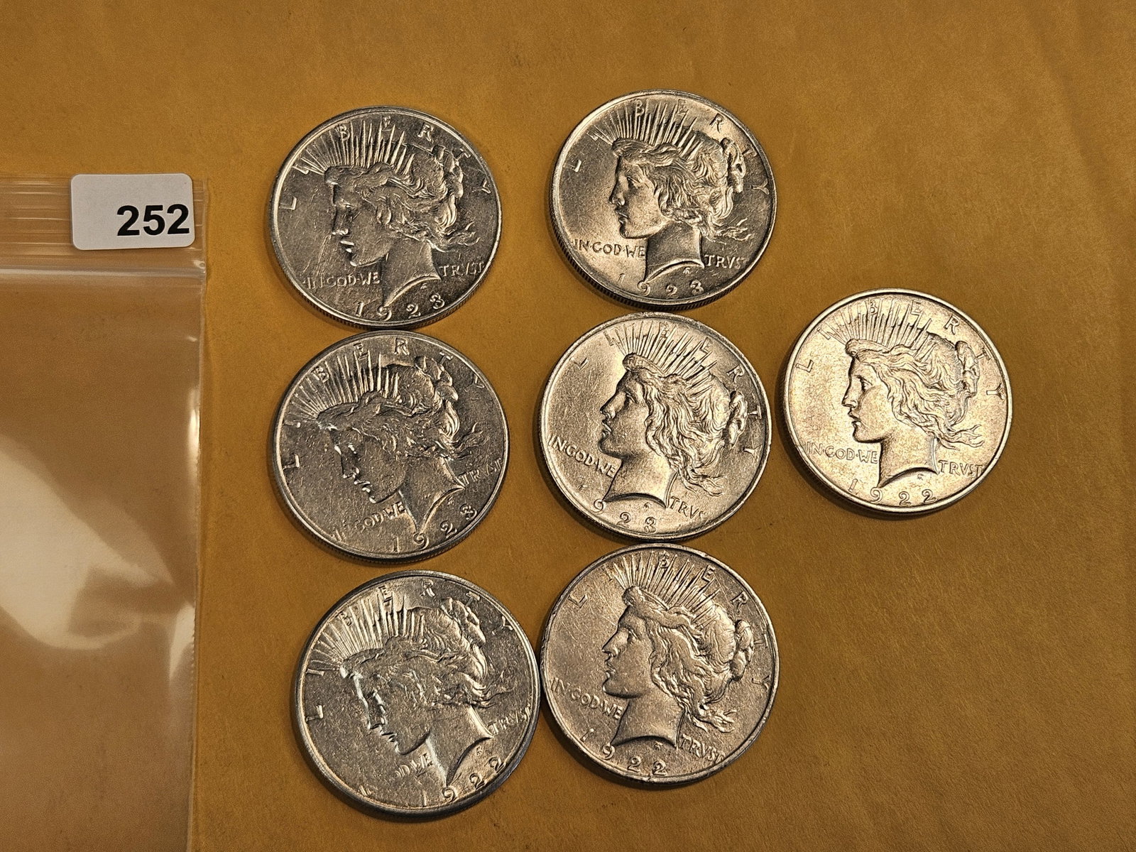 Seven mixed Silver Peace Dollars - 2