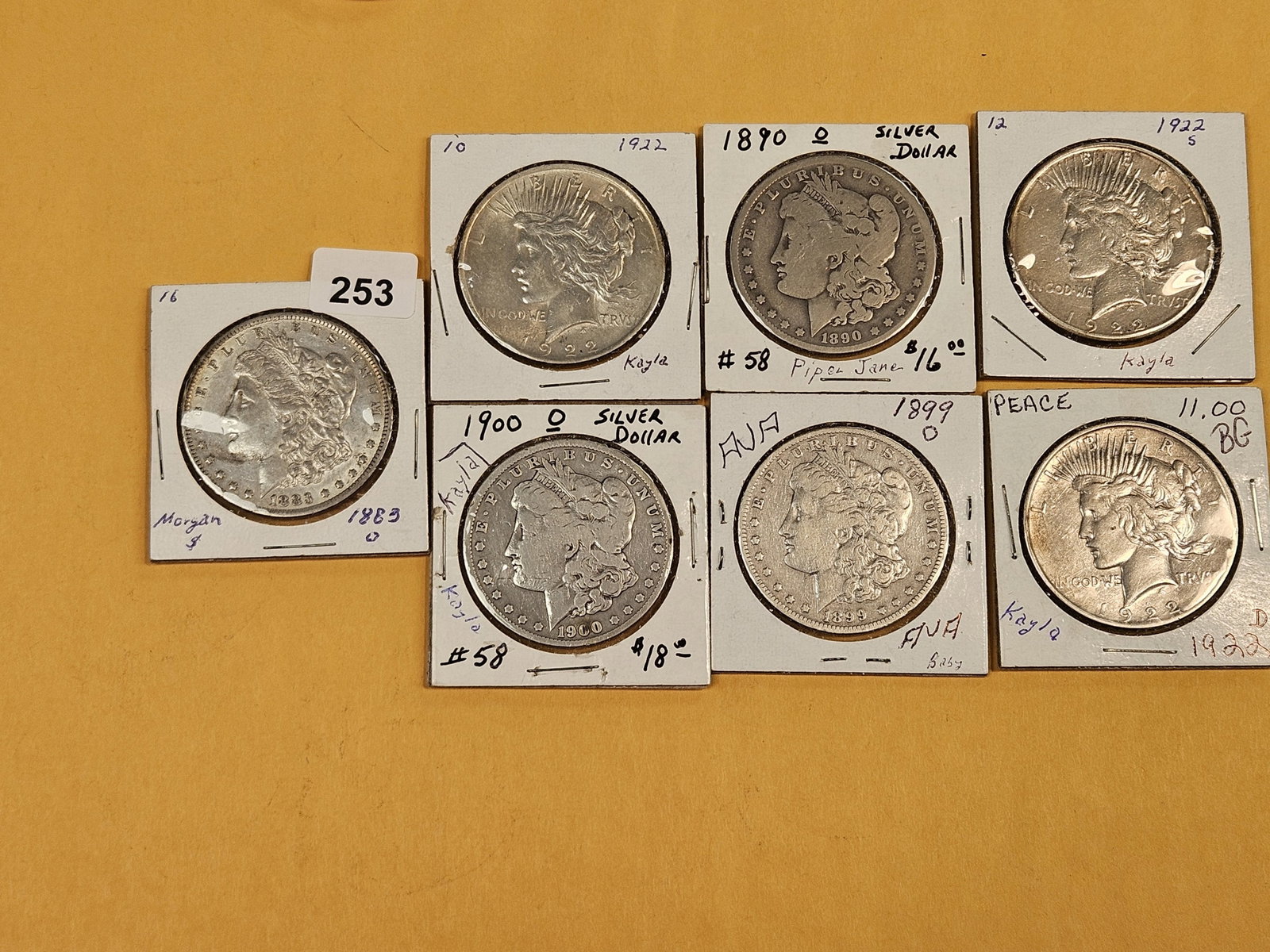 Seven mixed Silver Morgan and Peace Dollars - 2