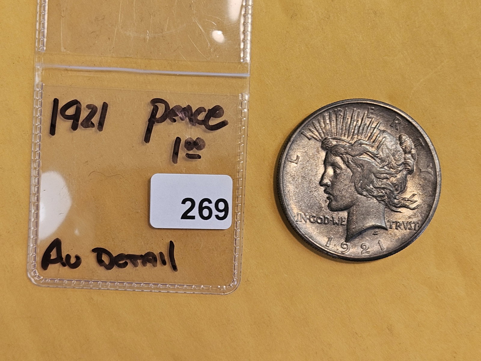 ** KEY DATE ** 1921 Peace silver Dollar in About Uncirculated - details - 2