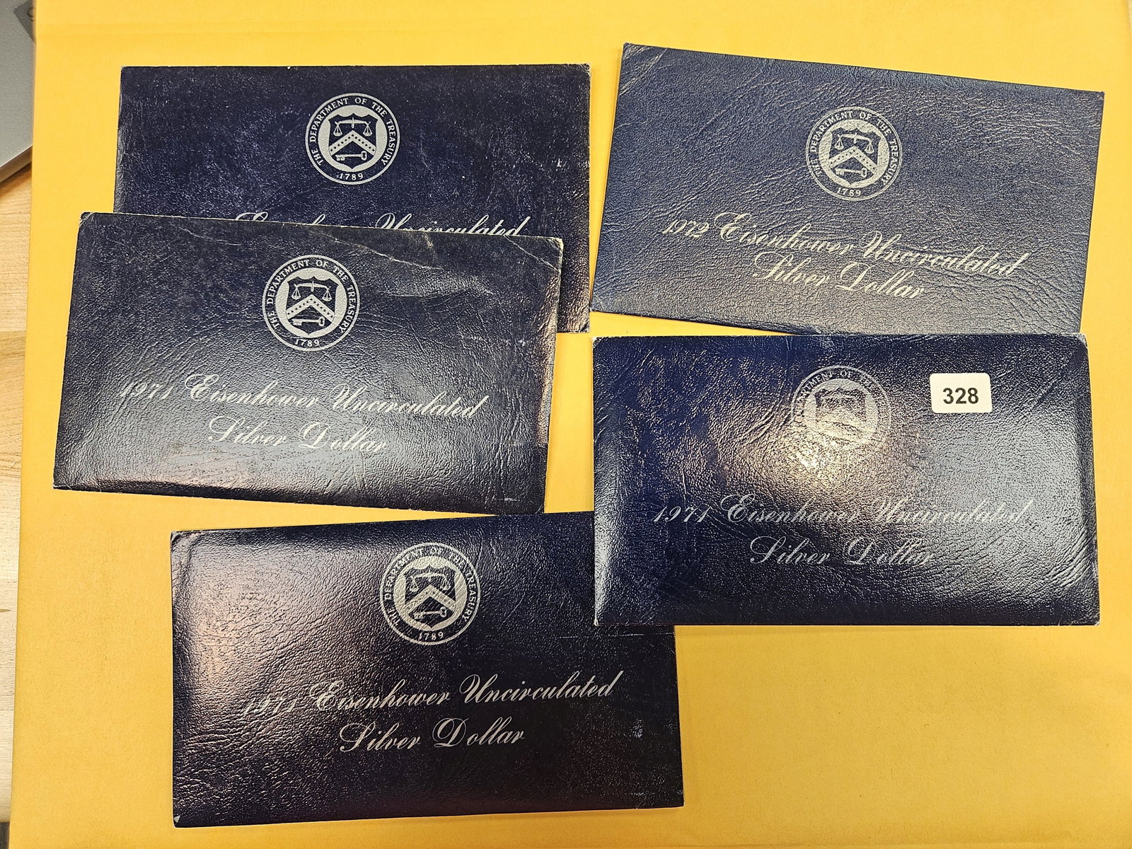 Five Uncirculated Silver Blue Ikes: Silver Eisenhower Dollars in GSA soft packs