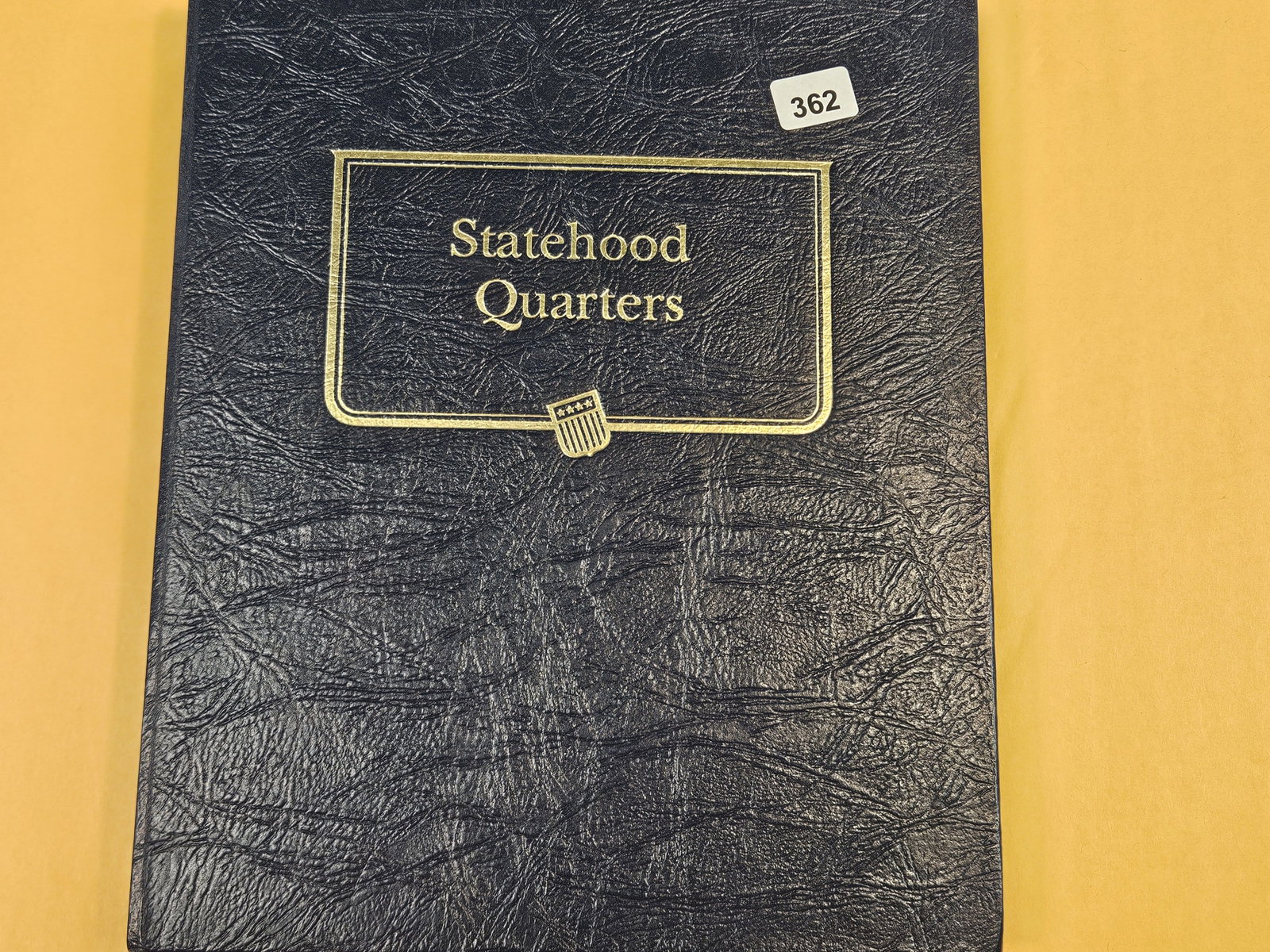 Complete Set of Brilliant Uncirculated Statehood quarters: In nice hard Whitman Classic album