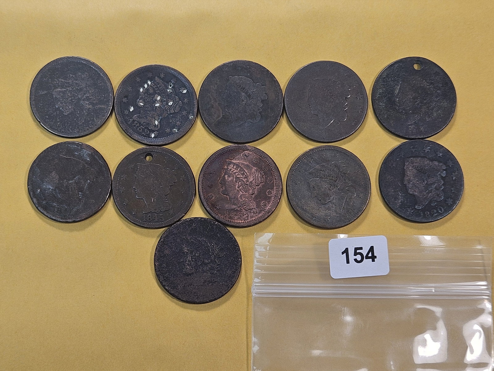 Eleven Mixed Large Cents: Seven Coronet Head and four Braided Hair Large Cents