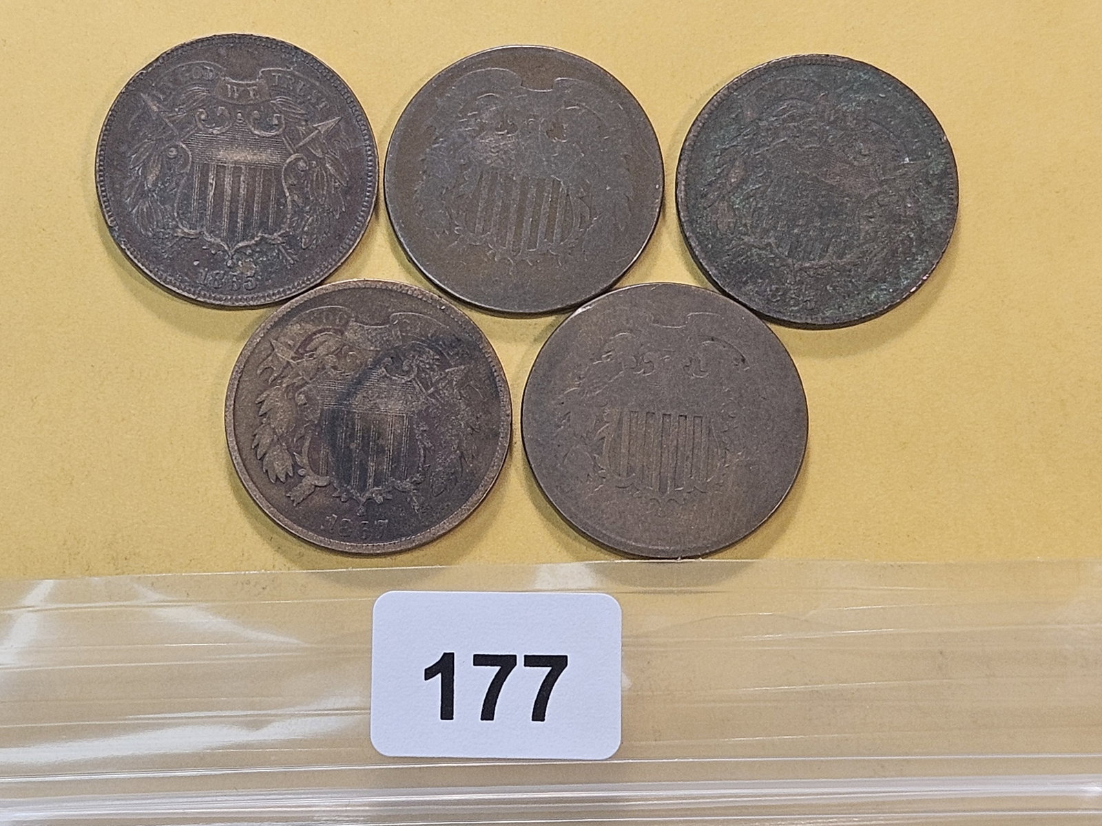 Five Circulated Two Cent Pieces: Two 1864, two 1865 and a 1867