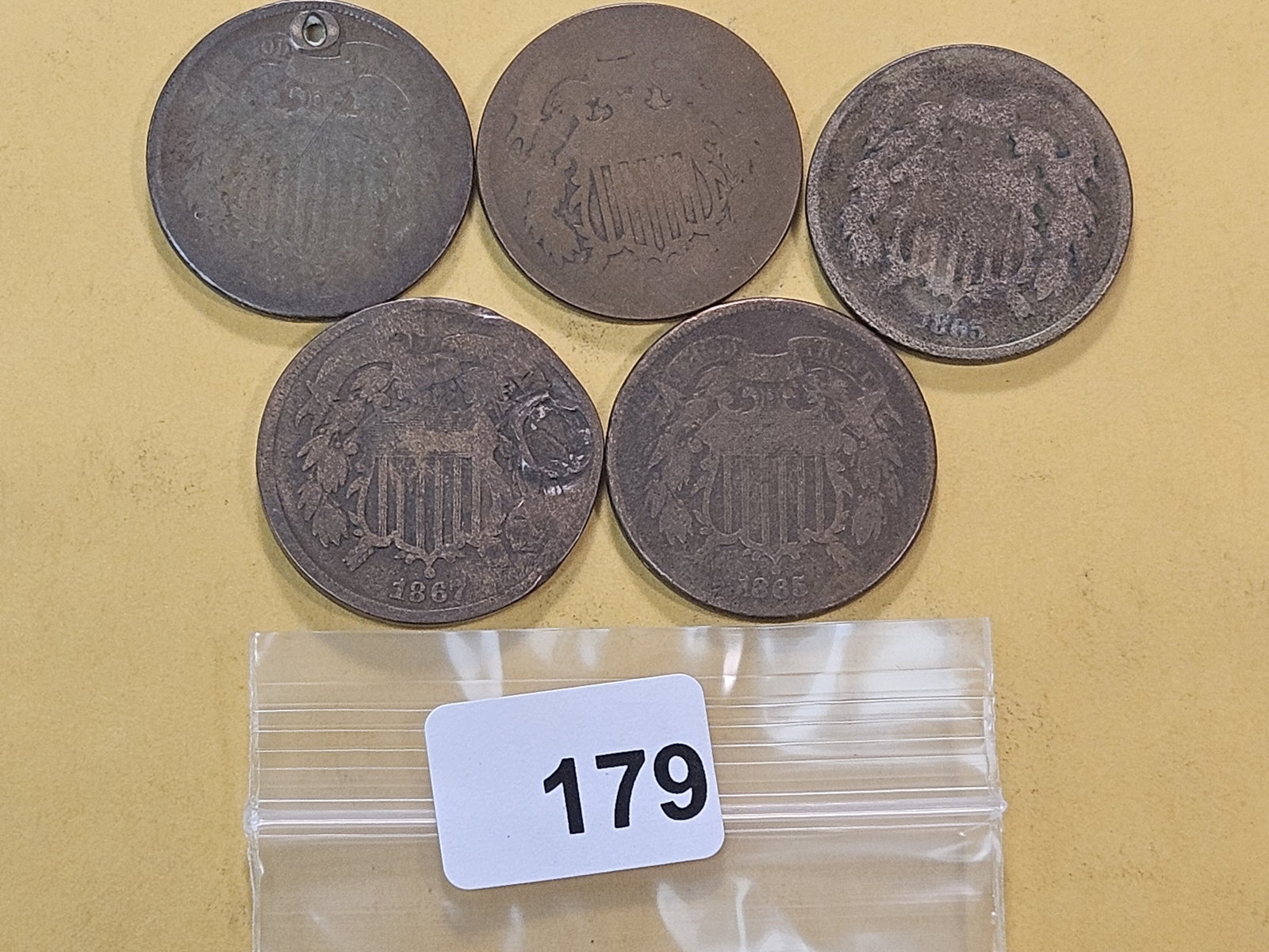 Five Circulated Two Cent Pieces: Two 1864, two 1865 and a 1867