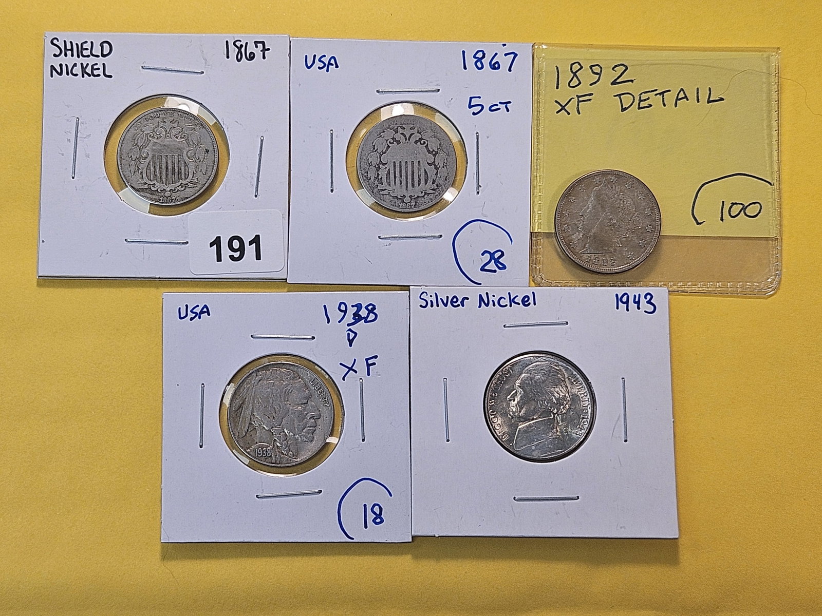 Five Mixed United States Nickels: Two 1967, 1892 Liberty V Nickel, 1938-D Buffalo Nickel and Brilliant Uncirculated 1943 Wartime Silver Nickel