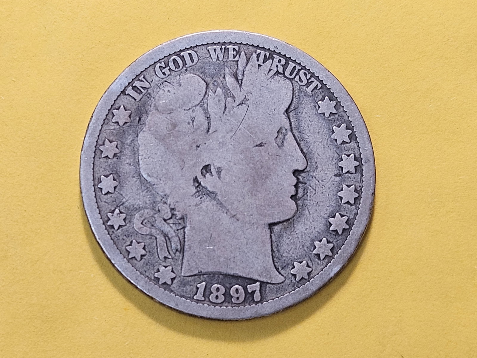Better Date 1897-O Barber Silver Half Dollar: In About Good plus!