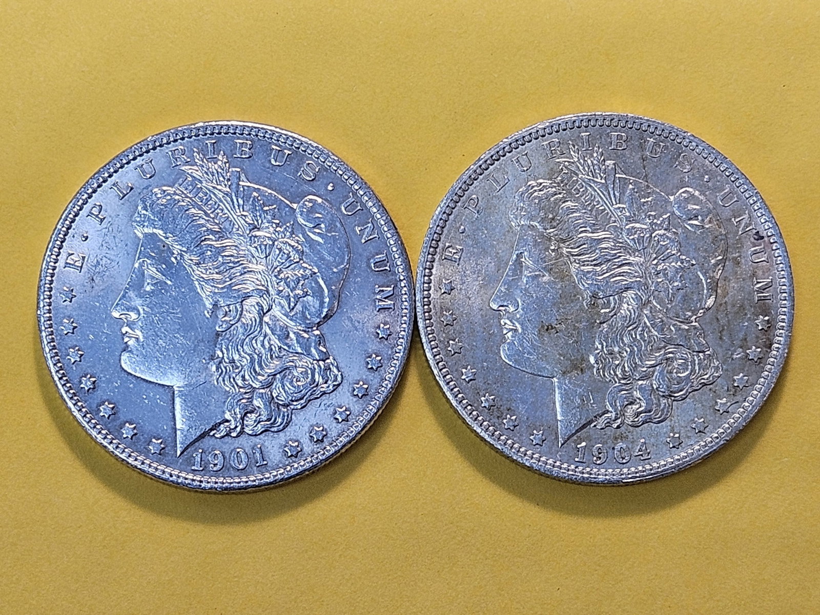 Two About Uncirculated Plus Morgan Silver Dollars - 2