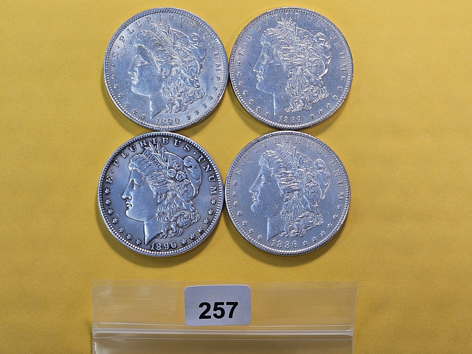 Four About Uncirculated Morgan Silver Dollars (1 of 4)