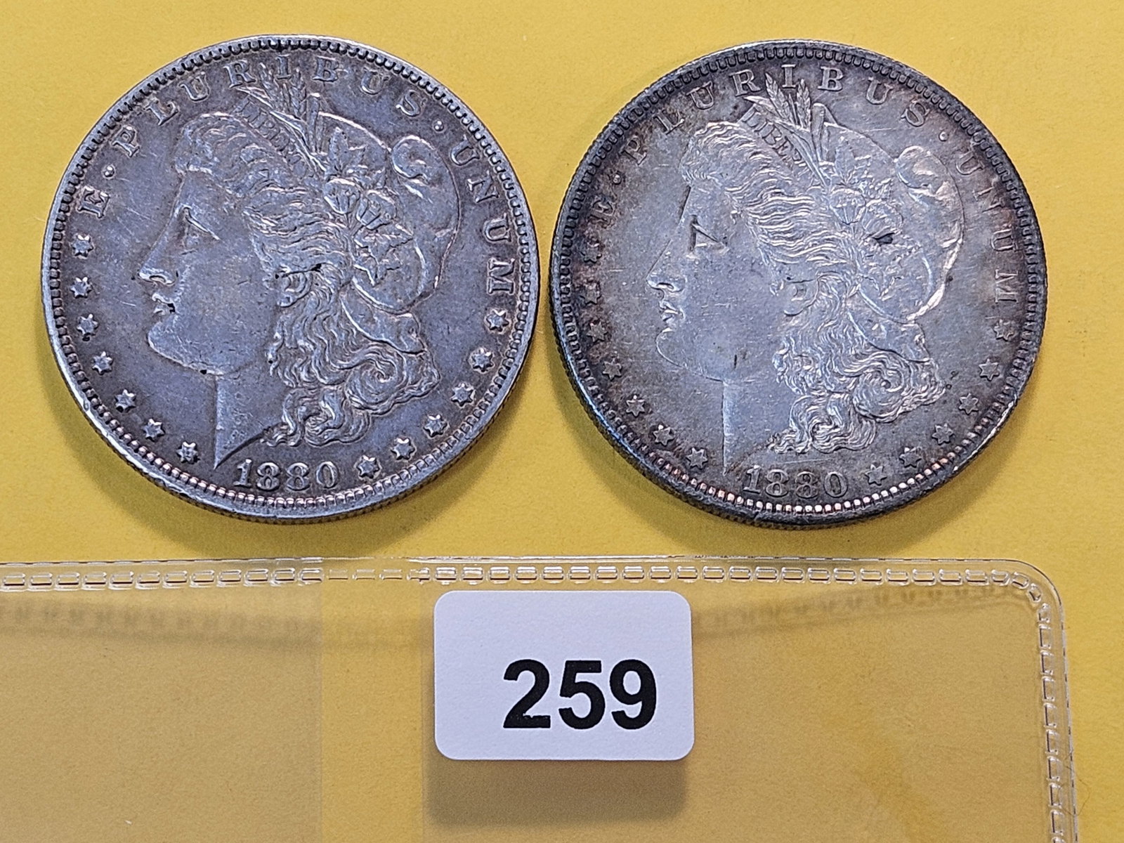 Two About Uncirculated Morgan Silver Dollars (1 of 4)