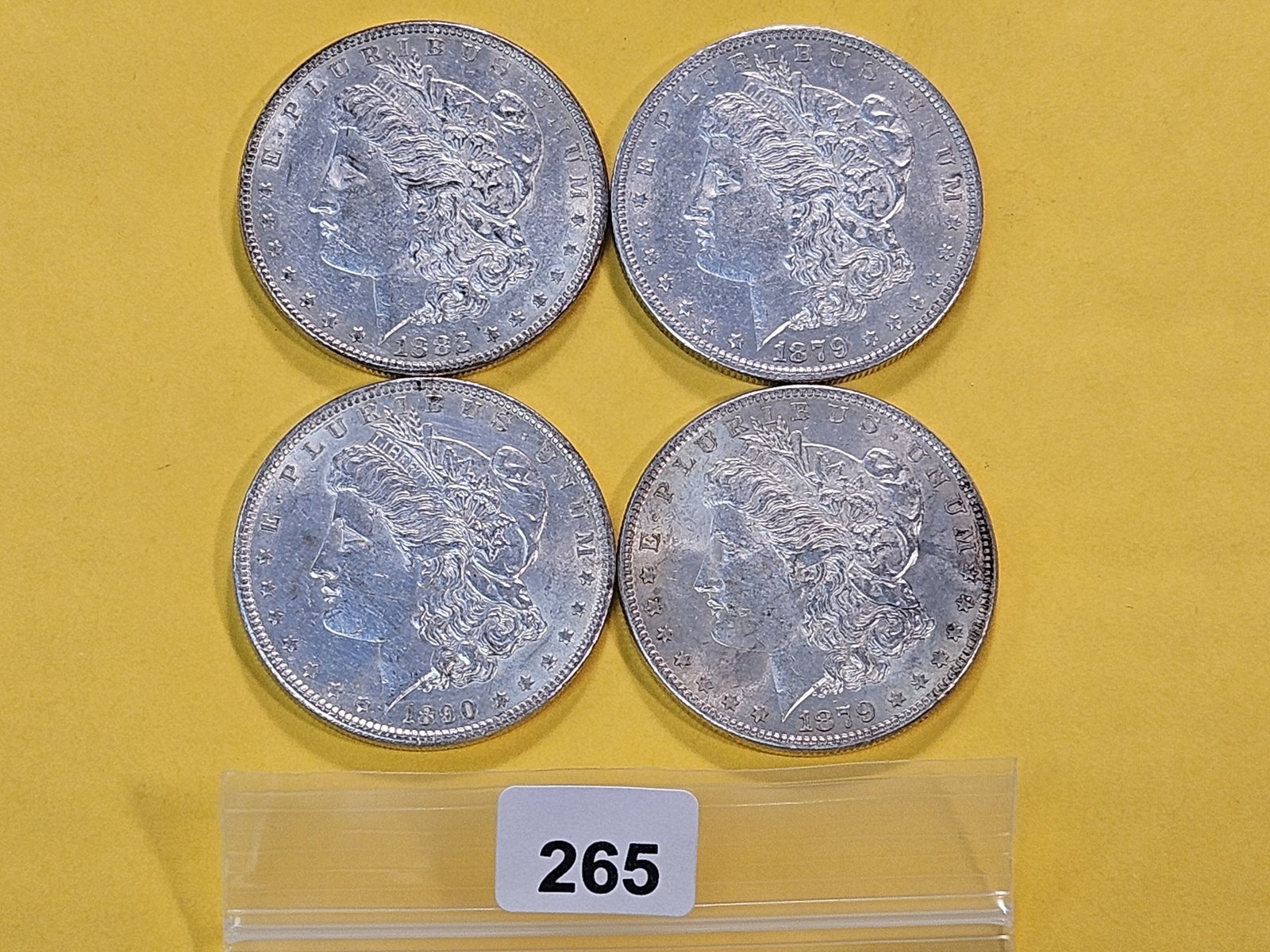 Four About Uncirculated Morgan Silver Dollars (1 of 4)
