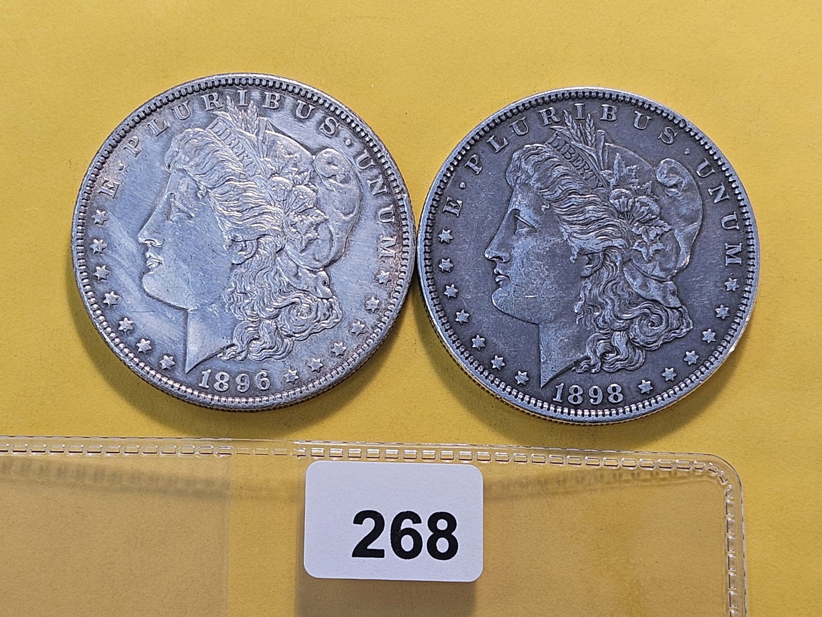 Two About Uncirculated Morgan Silver Dollars (1 of 4)