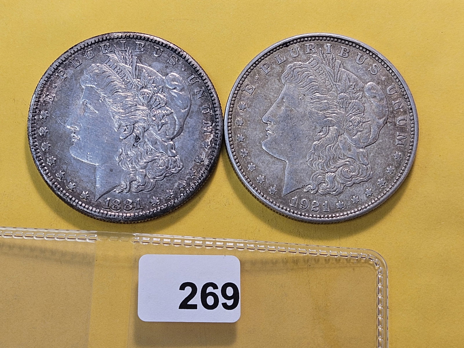 Two About Uncirculated Morgan Silver Dollars: 1881-S and 1921-D